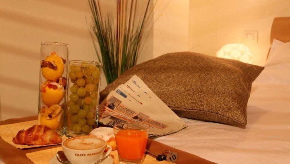 Residence Ilario Suite Hotel ริชโชเน ภายนอก รูปภาพ